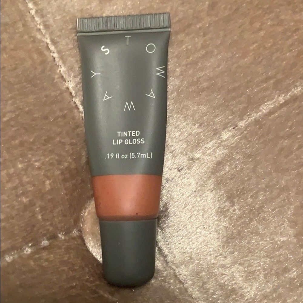 Stowaway tinted lip gloss, available in 3 colors